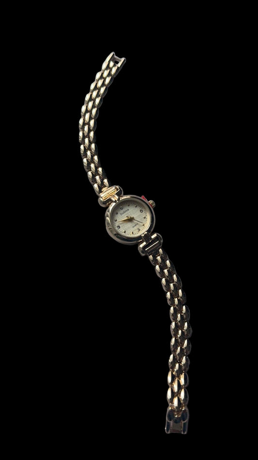 Gold round vintage watch